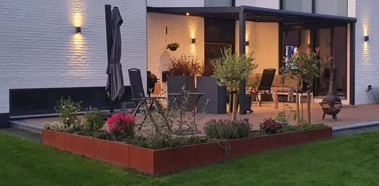 Atmosphäre schaffen mit Cortenstahl im Garten